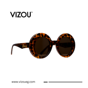 Sunglasses with leopard print frame on a white background, featuring the VIZOU brand.