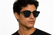 Classic black sunglasses with a sleek semi-rim design