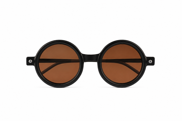 Minimalist round sunglasses with a matte black frame and warm brown lense